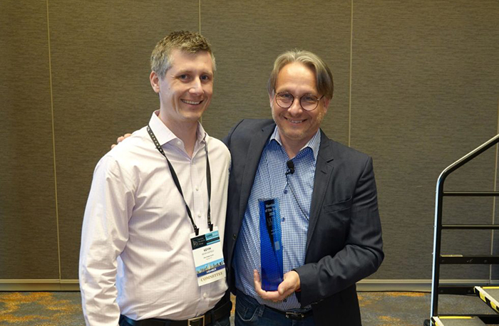 Kevin Castelo of Ultra Design Center Receives Award from LPG's Jeff MacDowell