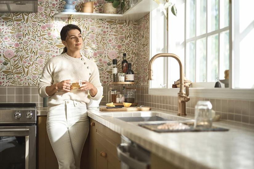 personalized kitchen with floral wallpaper and moen faucet