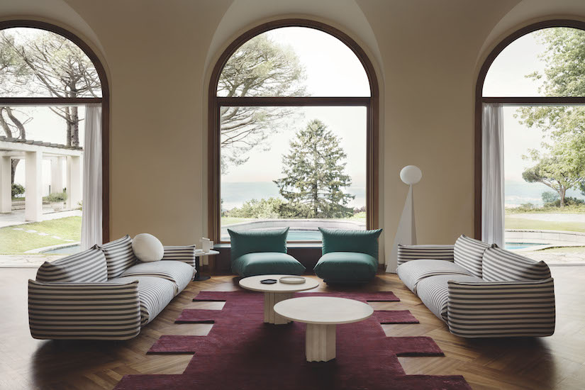 modern sofas in living room with arch-top window