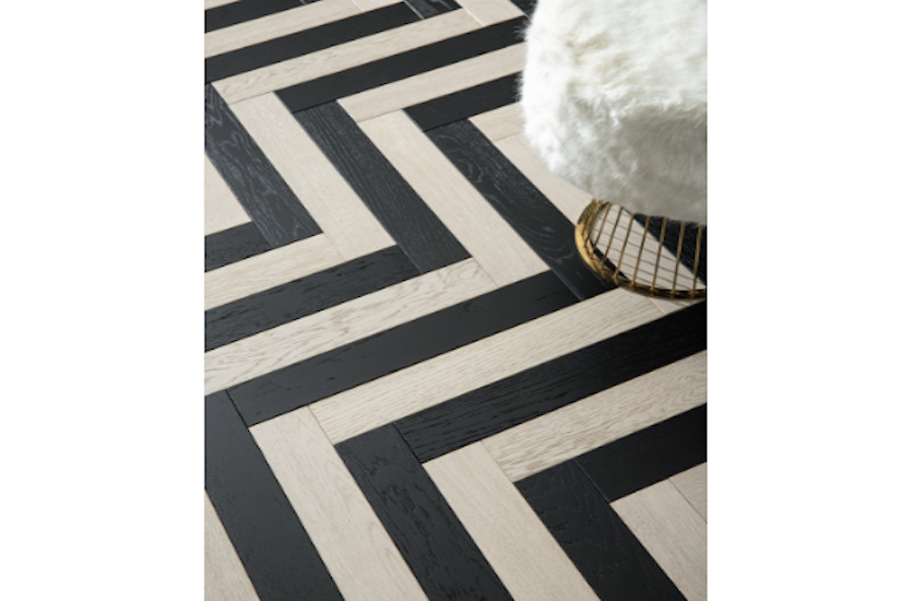 black and white wood floor in herringbone pattern