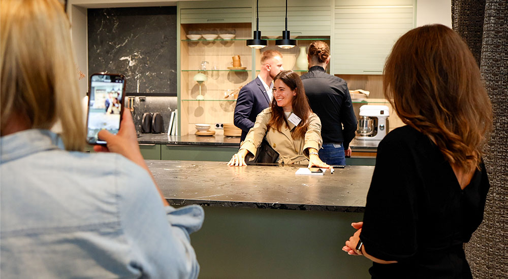 A moving table by Hacker kitchen that conceals the countertop and/or extends the countetop space.
