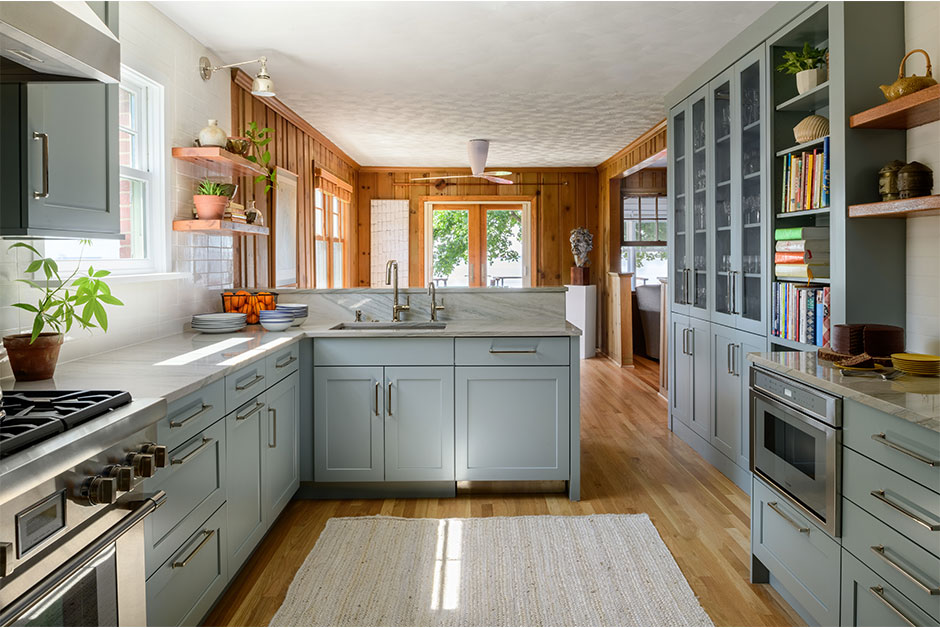 kitchen overlooking dining room and outside