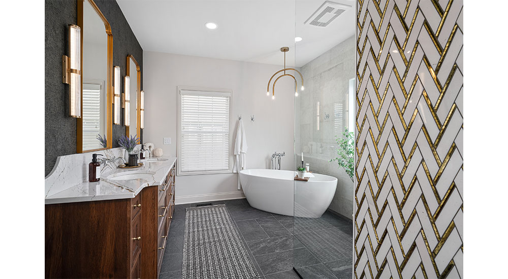 freestanding tub with chandelier and tile shower