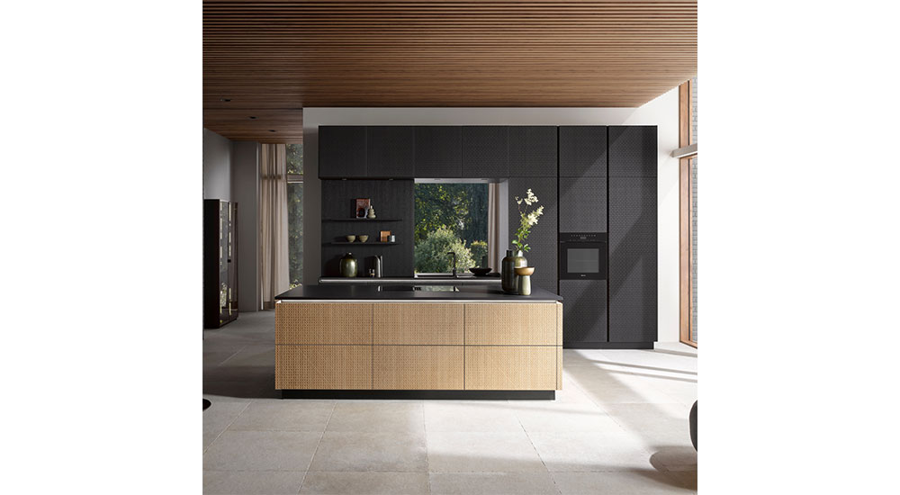 Shown is the new Rattan Cabinet Front from Häcker Kitchens.