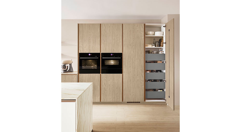 The nBOX drawer system from nobilia offers a hidden drawer guide and a push-to-open feature. Photo credit: nobilia