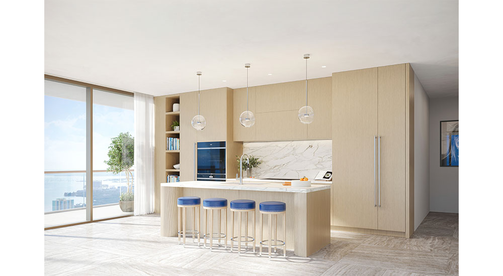 kitchen with light wood cabinets at cipriani Miami