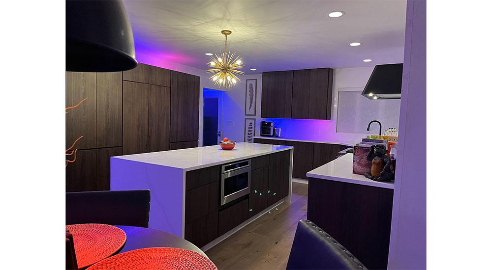 kitchen with moody colored lights