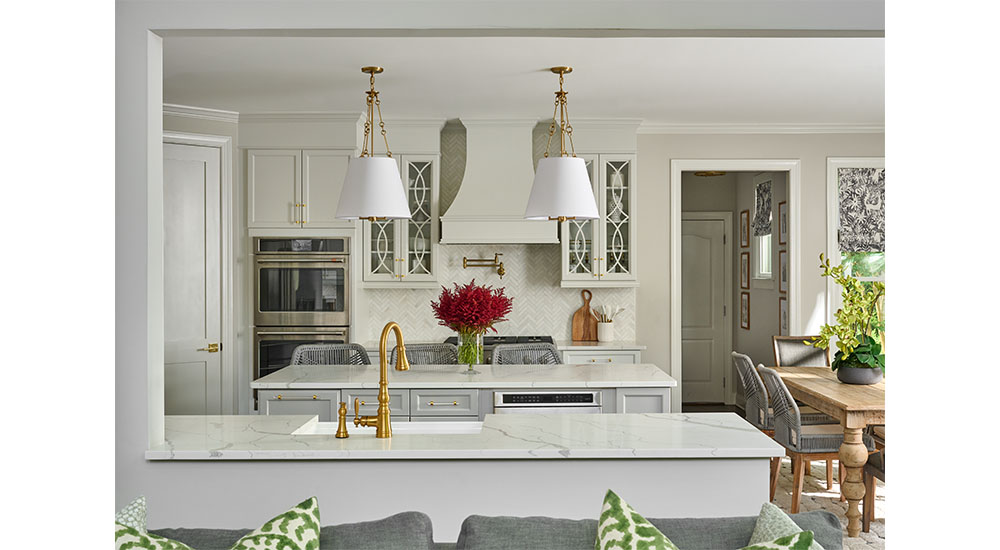 white kitchen cabinets and pendant lights