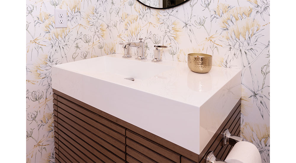 bathroom vanity with reeded cabinet and smooth solid sink