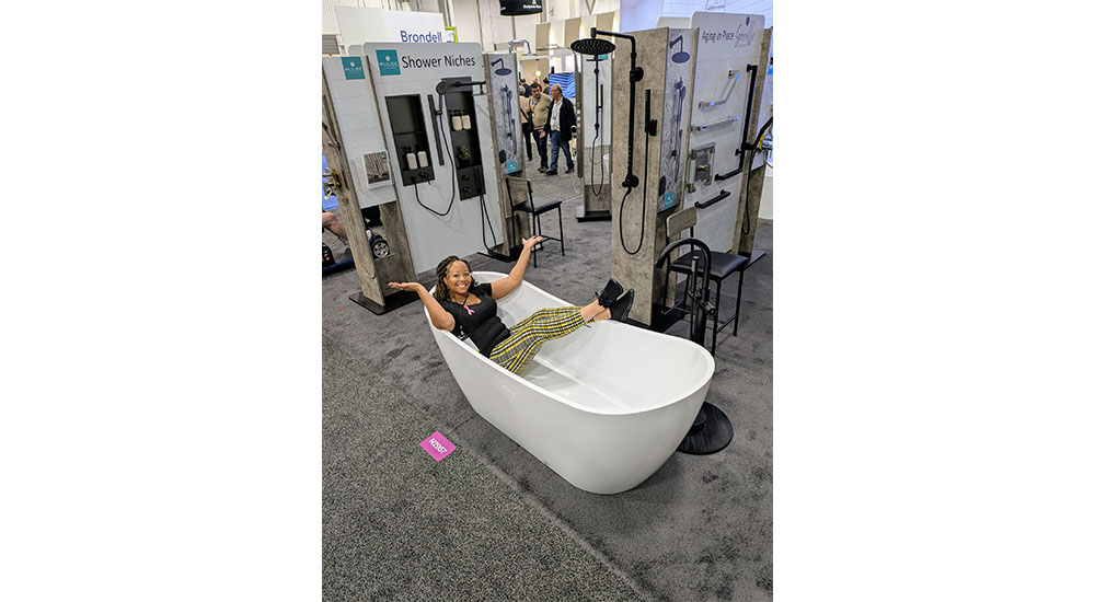 ebony Stephenson in pursue bathtub at kbis 2025