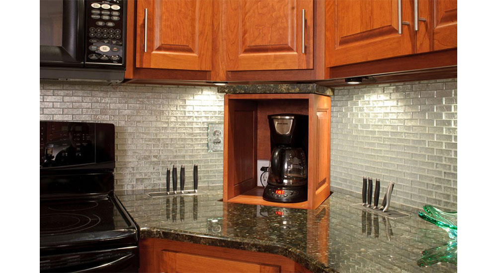 appliance lift with coffee maker in kitchen