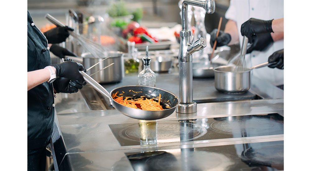 induction cooking in electric kitchen