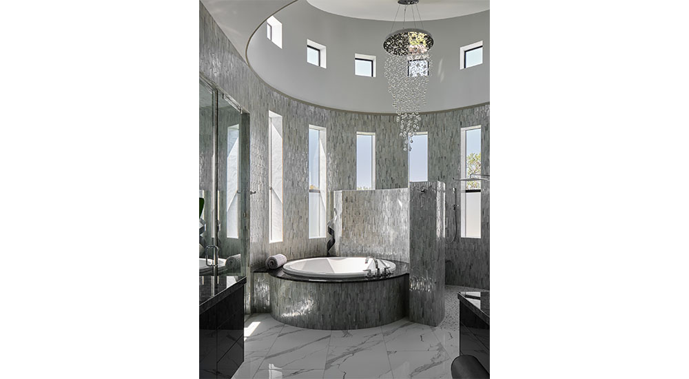 luxury bathroom with curved walls in tile
