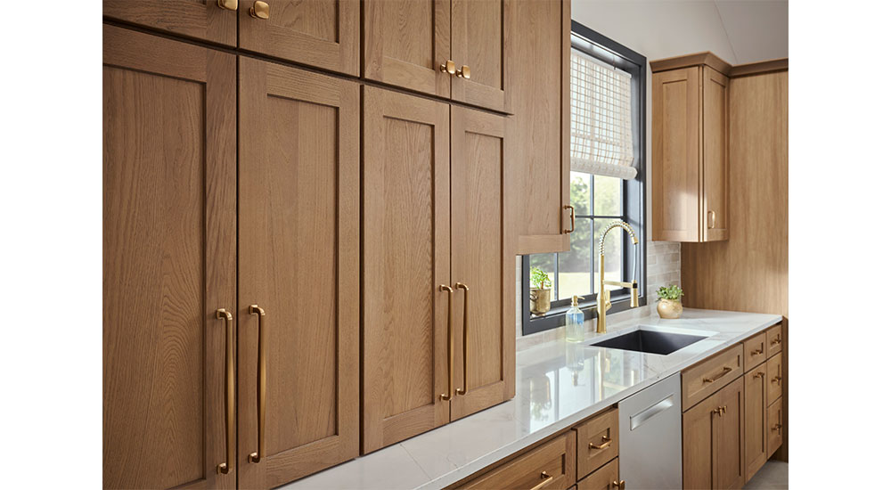Made from European White Oak and finished with a medium warm brown stain, Grove Chateau cabinetry offers unmatched natural beauty. 