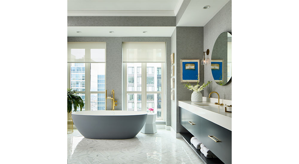 split finish blue and white bathtub in modern bath