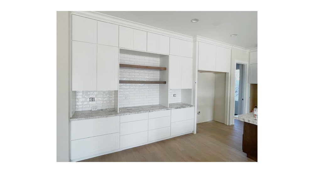 all white small modern kitchen under construction