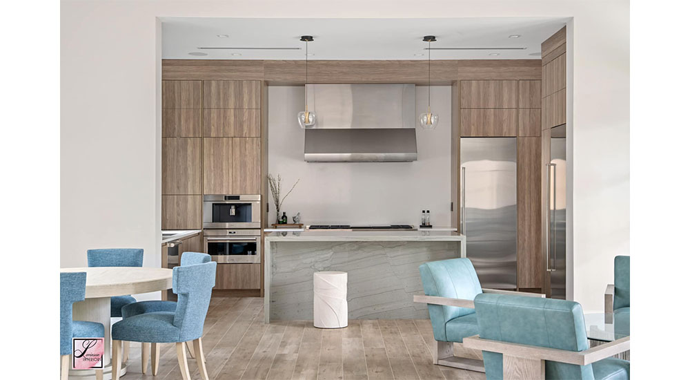 modern kitchen with blue seating and brown color wood cabinets