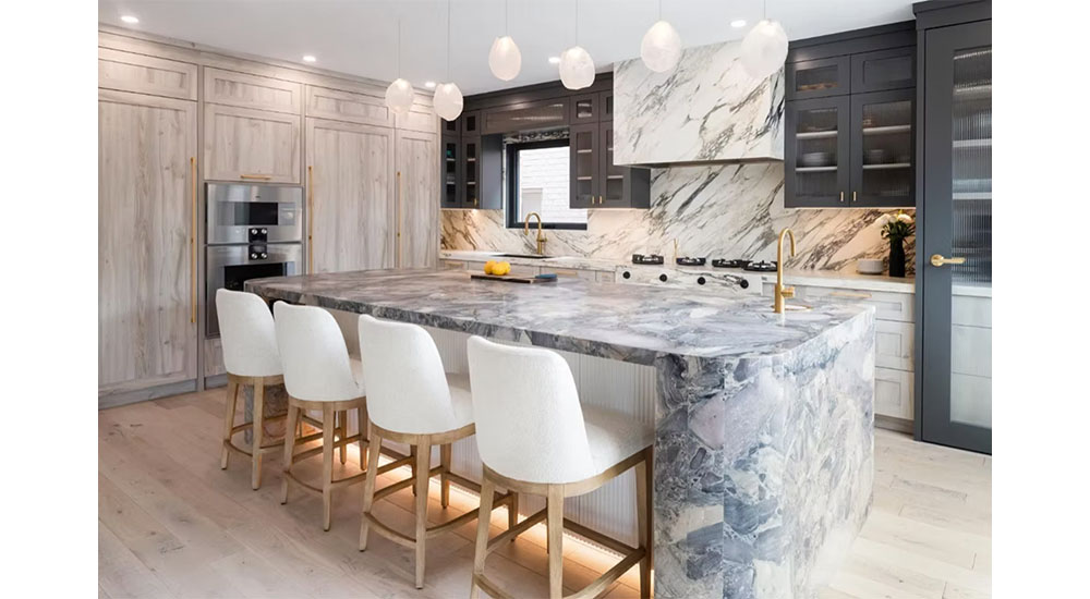kitchen with stone range hood and island