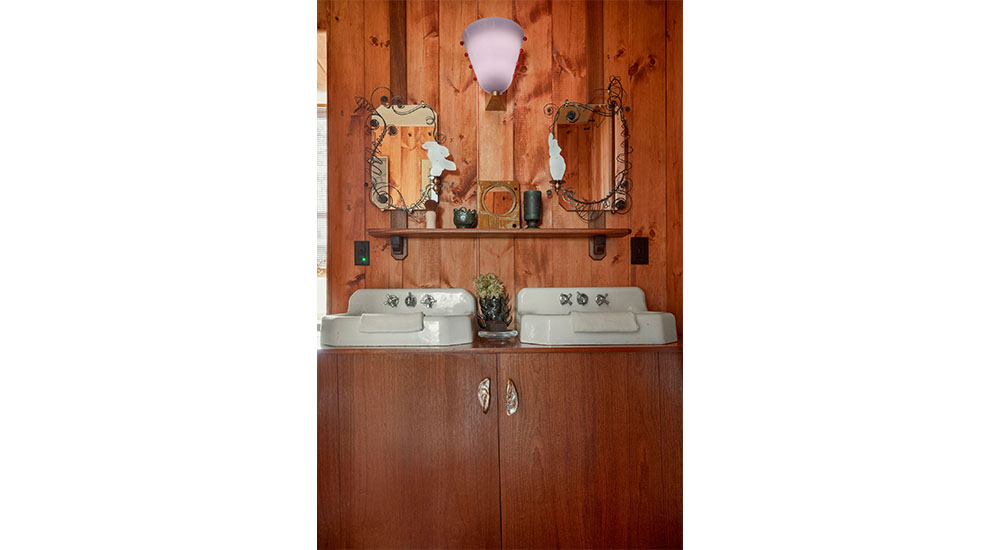kingston design showhouse primary bathroom two sinks rustic wooden walls
