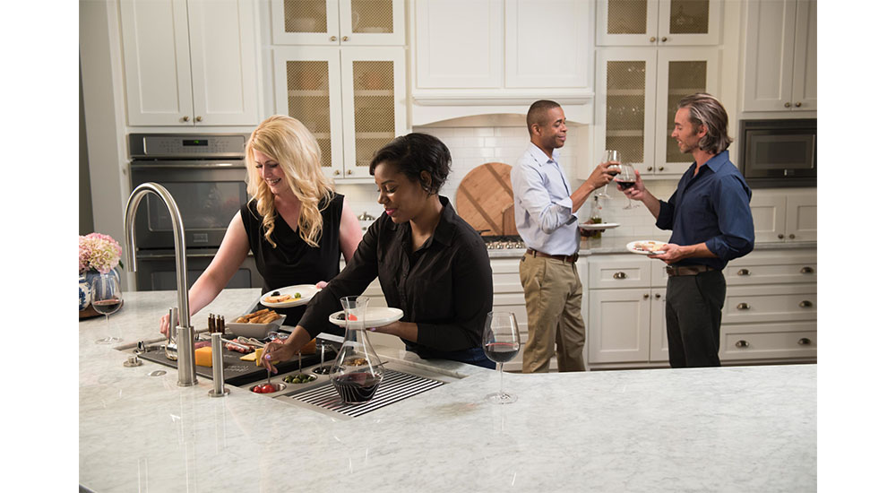 galley sink in kitchen during party