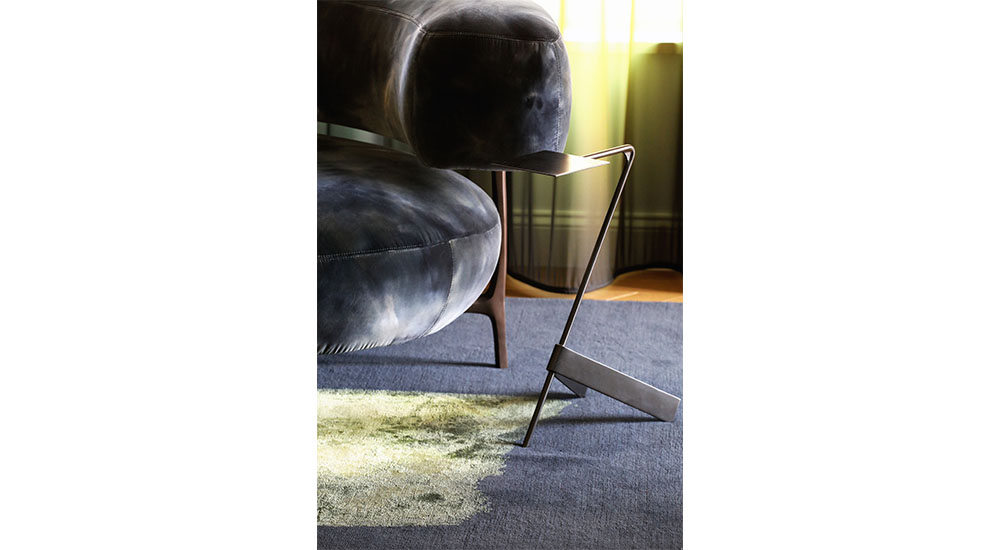 Jessica shaw design tactile rug and sofa and metal side table