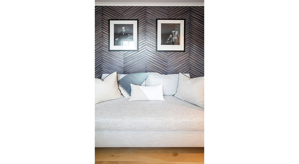 couch with art on wall